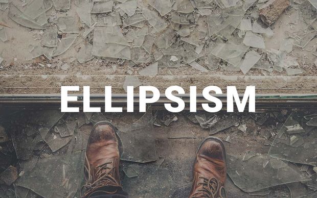 photo A downward view of a person's brown leather boots standing on a floor covered with shattered glass and debris, with the word 'ELLIPSISM' displayed in large white capital letters across the center of the image.