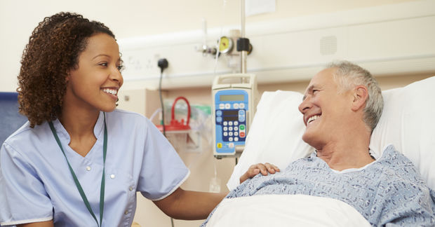 Nurse Nurse at a hospital taking care of a patient.
