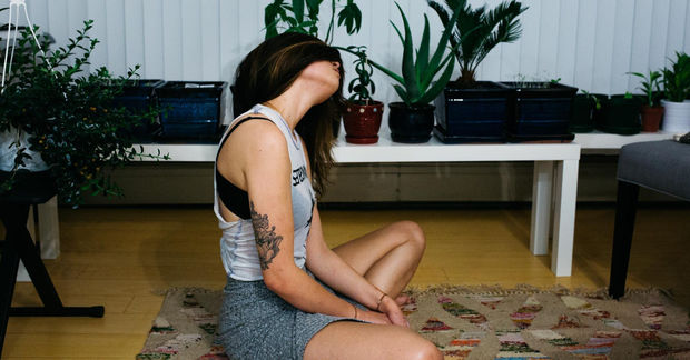 Woman Woman stretching her neck.